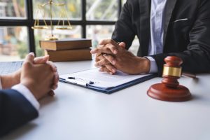 lawyer or judge advising client's trial at attorney's office